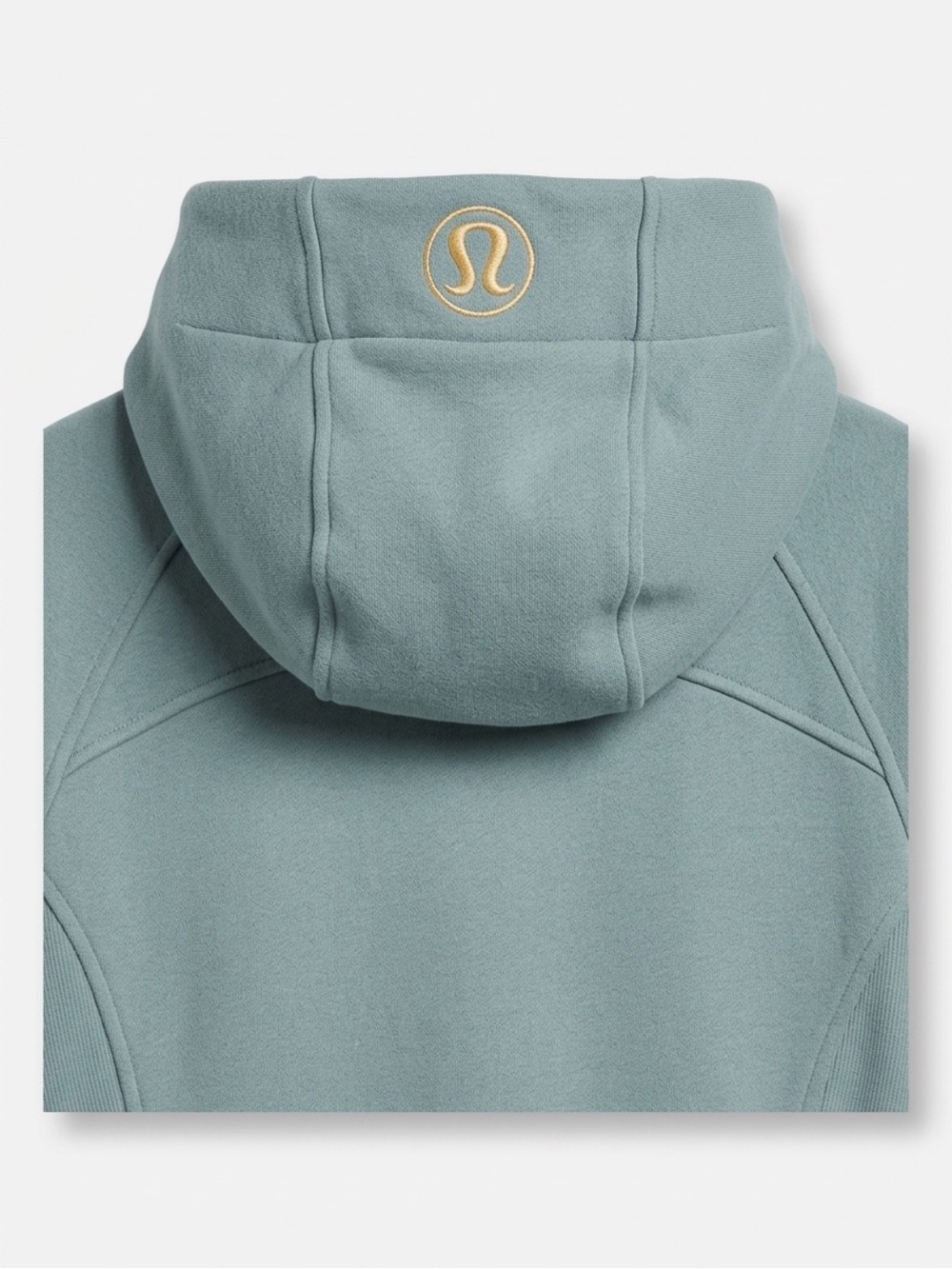 lululemon women’s Zip-Up Scuba Hoodie in Dusty Teal with Gold Logo and zipper.